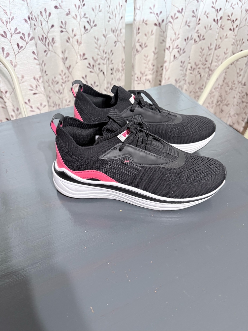 Puma Women’s Black and Pink Knit Slip-On Sneakers